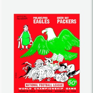 May include: A vintage 1960 National Football League World Championship game program featuring the Philadelphia Eagles and Green Bay Packers. The program cover features a cartoon eagle with a red background and the text "OFFICIAL PROGRAM", "PHILADELPHIA EAGLES", "GREEN BAY PACKERS", "NATIONAL FOOTBALL LEAGUE", "WORLD CHAMPIONSHIP GAME", "FRANKLIN FIELD - PHILADELPHIA - DECEMBER 26, 1960", and "50¢".