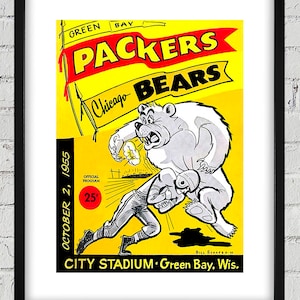 May include: A vintage yellow and red Green Bay Packers vs. Chicago Bears football game program from October 2, 1955. The program features a cartoon illustration of a bear tackling a football player. The text "CITY STADIUM Green Bay, Wis." is at the bottom of the program.