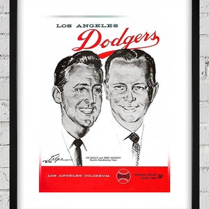 May include: A vintage Los Angeles Dodgers scorecard featuring a black and white illustration of two men, Vin Scully and Jerry Doggett, with the team's logo and the words "Los Angeles Dodgers" in red.
