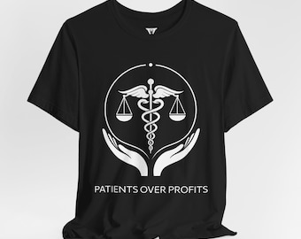 May include: Black t-shirt with a white graphic of a caduceus, scales, and hands. The text "PATIENTS OVER PROFITS" is printed below the graphic.