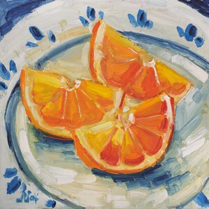 Original oil painting of juicy orange slices, elegantly presented in a frame. The artwork is captured in a vibrant impressionist style with bold, thick brushstrokes that highlight the glistening texture of the fruit. Featuring a bright citrus palette and a beautiful play of light, this small fruit still life is a perfect pop of color for a modern kitchen or a sunny dining room wall.