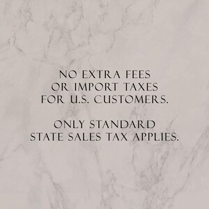 May include: A light beige background with a marble texture featuring the black text: NO EXTRA FEES OR IMPORT TAXES FOR U.S. CUSTOMERS. ONLY STANDARD STATE SALES TAX APPLIES. The text is centered and written in a clean, sans-serif, uppercase font style.