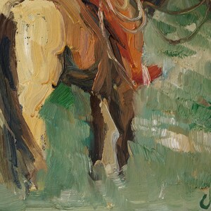 May include: An oil painting on canvas depicting a tan and brown horse standing in a field of green grass. The horse is shown from the rear, featuring visible brushstrokes and a signature in the bottom right corner. The scene uses earthy tones.