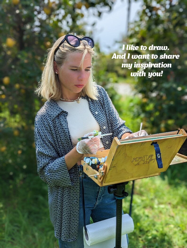 May include: A person wearing a dark patterned button-down shirt, a light-colored top, and blue jeans, holding a paintbrush over a wooden easel box. The text "I like to draw. And I want to share my inspiration with you!" is visible in the upper right corner.