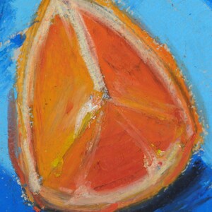 May include: A hand-painted orange fruit with a red center and white lines, on a blue background.