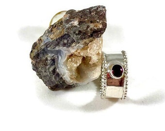 R128 Silver and Garnet Ring