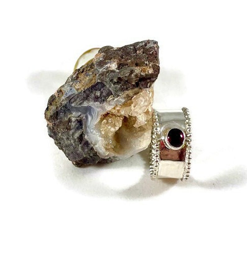 R128 Silver and Garnet Ring image 1