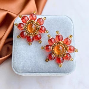 Orecchini Christian Lacroix vintage anni &#39;90 placcati oro con design a sole