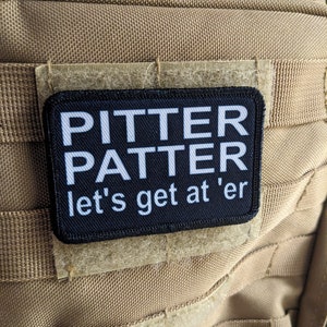 Pitter patter let&#39;s get at &#39;er meme 2&quot;x3&quot; removable morale patch with hook and loop backing black and white