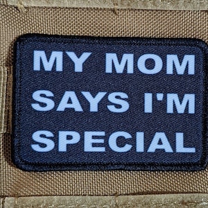 my mom says i&#39;m special funny 2&quot;x3&quot; morale patch with hook and loop backing green background