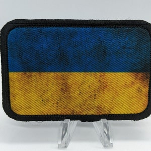 distressed Ukraine Flag stand with Ukraine 2&quot;x3&quot; morale patch with hook and loop backing