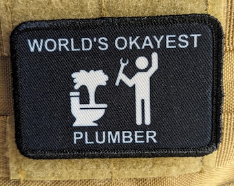 World's okayest plumber blue collar welding 2"x3" morale patch with hook and loop backing