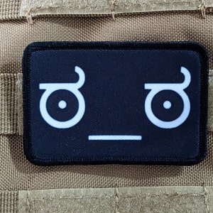 Lenny face of disapproval face black background meme 2"x3" morale patch with hook and loop backing