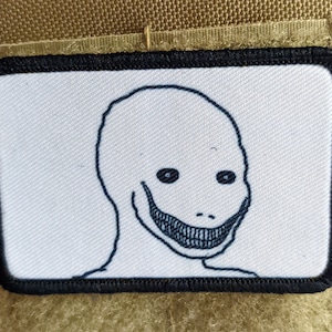 Psycho smile wojak creepy meme 2&quot;x3&quot; morale patch with hook and loop backing