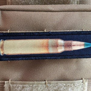 556 green tip round military 1&quot;x4&quot; removable morale patch with hook and loop backing good for back of operator hats