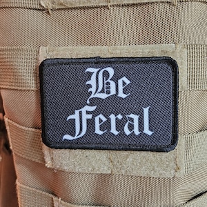 Black and white &quot;be feral&quot; girls and boys meme 2&quot;x3&quot; morale patch with hook and loop backing