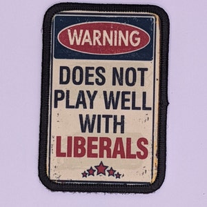 Does not play well with liberals meme 2"x3" morale patch with hook and loop backing