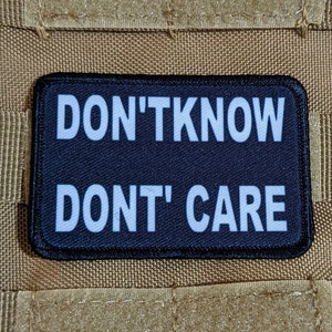 Don&#39;t Know Don&#39;t Care funny 2&quot;x3&quot; morale patch with hook and loop backing green background