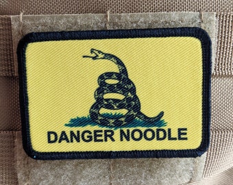 Danger noodle Gadsden flag meme  2"x3" removable morale patch with hook and loop backing