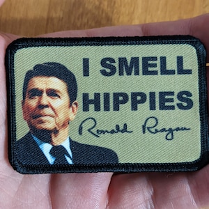 I smell hippies Ronald Reagan joke 2&quot;x3&quot; morale patch with hook and loop backing