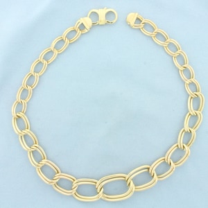 Graduated 16 Inch Double Oval Link Chain Necklace in 14k Yellow Gold