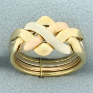 Anillo rompecabezas italiano tricolor en oro amarillo, blanco y rosa de 18 k