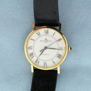 Mens Baume and Mercier Swiss Watch Model 65225 in Solid 14k Yellow Gold Case