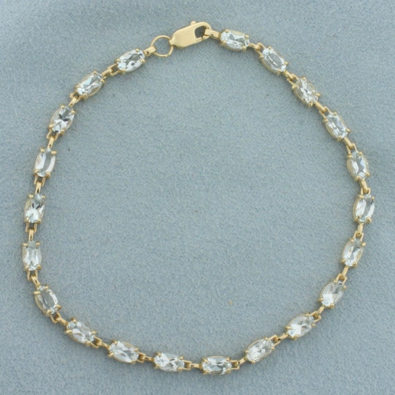 Aquamarine Tennis Bracelet in 10k Yellow Gold - image 1