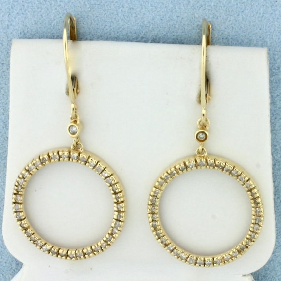 Diamond Circle Dangle Earrings In 14k Yellow Gold - image 1