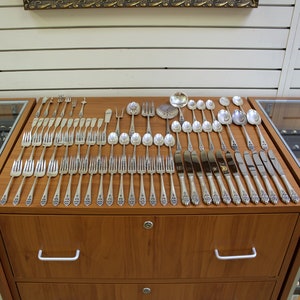 International Queen&#39;s Lace Seventy-Nine Piece Sterling Silver Flatware Set