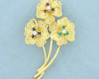 Vintage Dankner Emerald, Sapphire, Ruby, and Diamond Flower Pin in 18K Yellow Gold