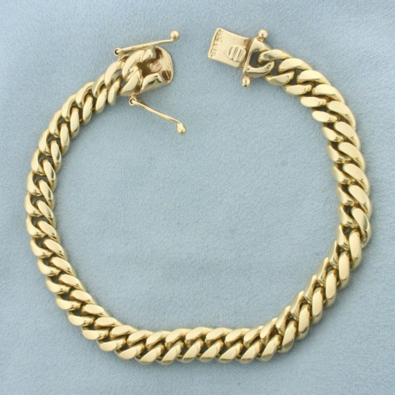 Mens Heavy Curb Link Bracelet in 14k Yellow Gold - image 1