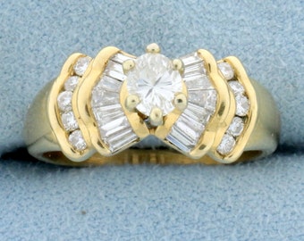 Oval Baguette and Round Diamond Engagement Ring in 14K Yellow Gold