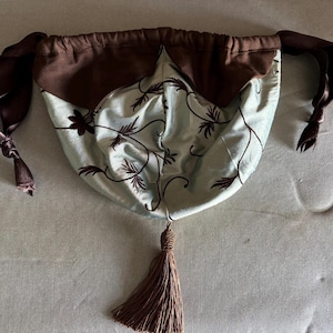 Regency style lantern shaped reticule in duck egg embroidered silk with brown petals and tassel