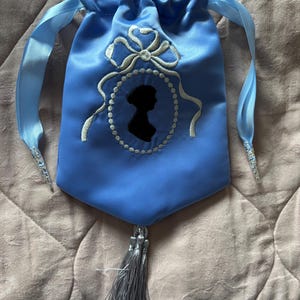 Blue satin embroidered Regency style reticule with Jane Austen silhouette and tassel