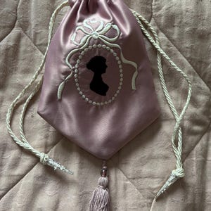 Dusky pink sateen embroidered Regency style reticule with Jane Austen silhouette and tassel