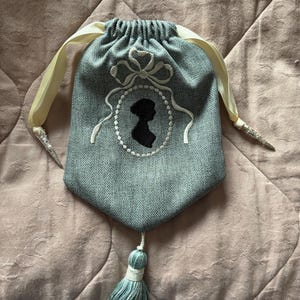 Dusky blue tweed embroidered Regency style reticule with Jane Austen silhouette and tassel