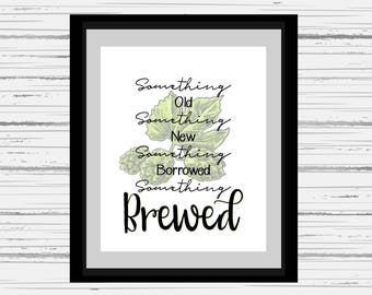 May include: A framed print with a green and white illustration of hops and the text "Something Old, Something New, Something Borrowed, Something Brewed".