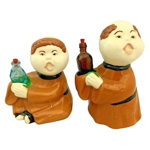 Pair of Ceramic Monk Figurines Holding Wine / Liquor Bottles - 5&quot; & 6&quot; Tall