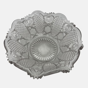 Bol vintage en verre pressé transparent, bords festonnés, design texturé étoiles soleil