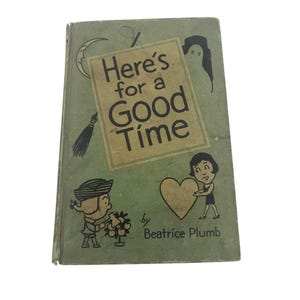 May include: A vintage book cover with the title "Here's for a Good Time" in a tan rectangle on a green background. The cover features illustrations of a crescent moon, a witch's broom, a ghost, and cartoon figures. The author is Beatrice Plumb.