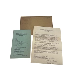 May include: A collection of vintage documents, including a letter from the U.S. Department of Agriculture, a green booklet with illustrations, and a brown envelope. The documents appear to relate to agricultural programs and conservation practices.