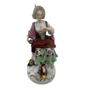 Vintage Porcelain Lady Figurine Wearing Floral Dress Sitting on Stump 6.25&quot;