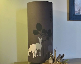 Lamp gray with deer, hinds and fawns. Contemporary Nordic design lighting with nature and forest atmosphere