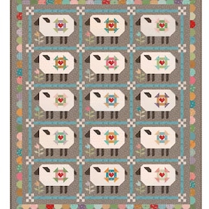 May include: A patchwork quilt featuring a repeating pattern of white sheep with colorful heart-shaped designs. The quilt has a gray background with blue and floral accents, and a scalloped border. The sheep are arranged in a grid.
