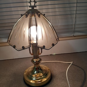 brass look and glass table lamp.