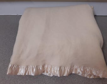 Cream pure wool blanket.