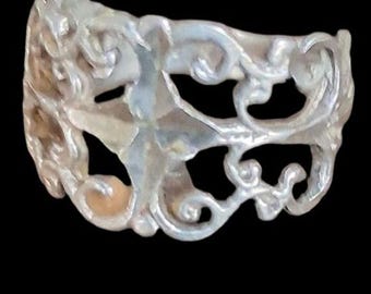 Anello vintage in argento sterling con filigrana traforata e volute