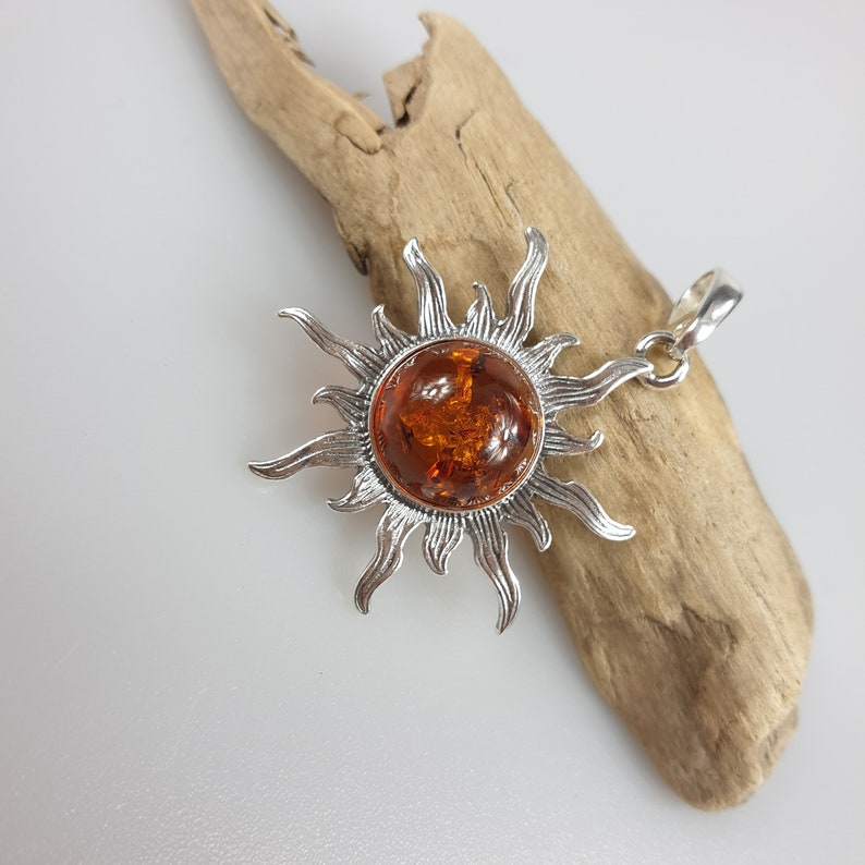 Sterling silver baltisk bärnsten flammande solhänge solcellsdrivet Brown pendant