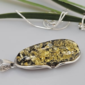 Grun Bernstein Anhanger und Silber 925 Anhanger. Gross echt grun bernstein canpchone. Gross Anhanger. Ostsee schmuck
